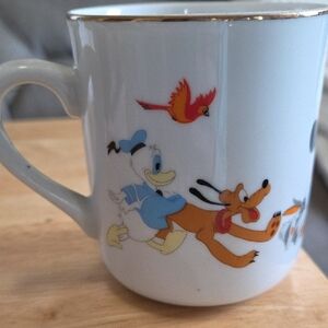 Disney Mug with Donald and Pluto Design